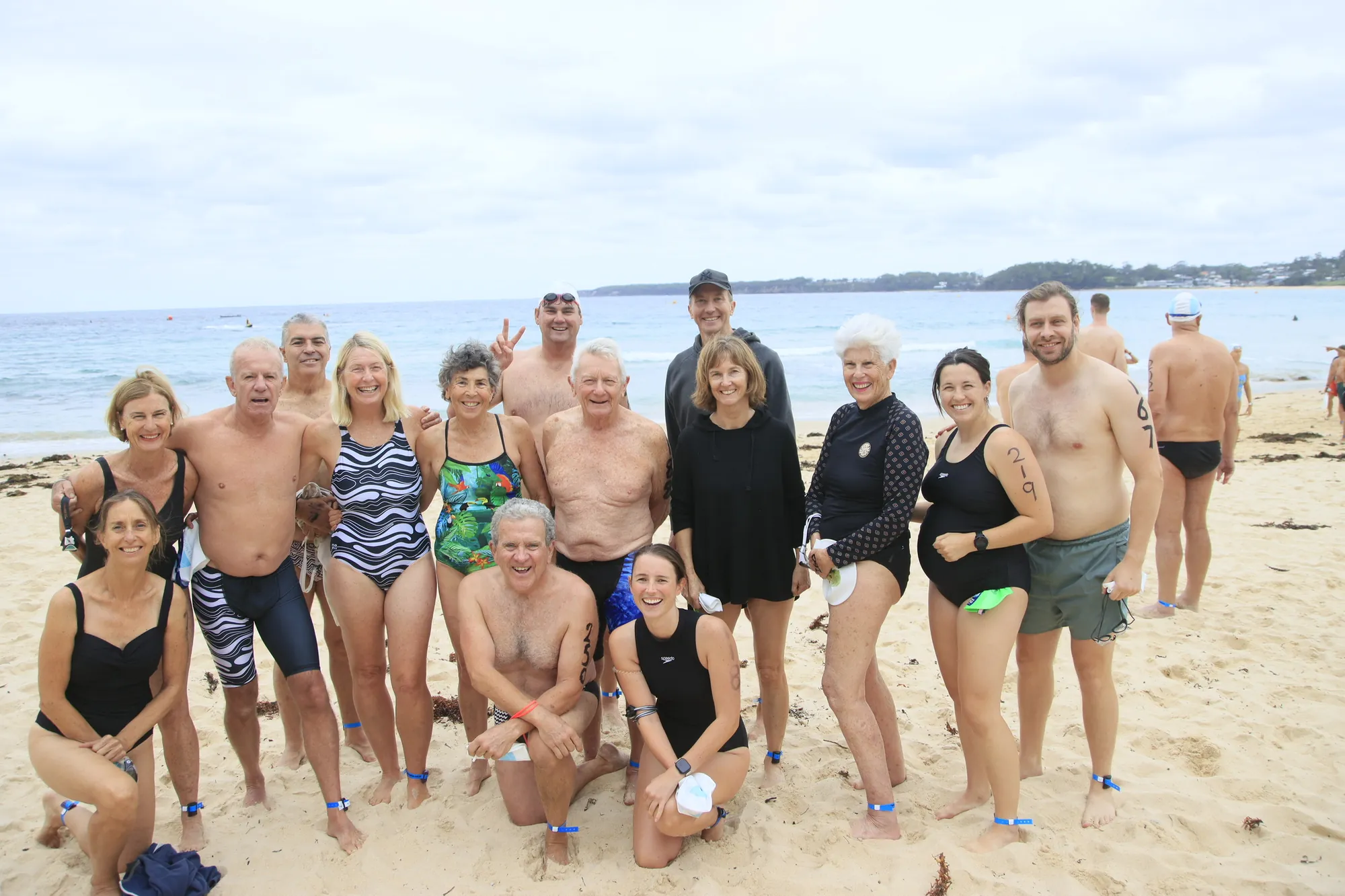 Mollymook ocean swimmers gathered together on the beach